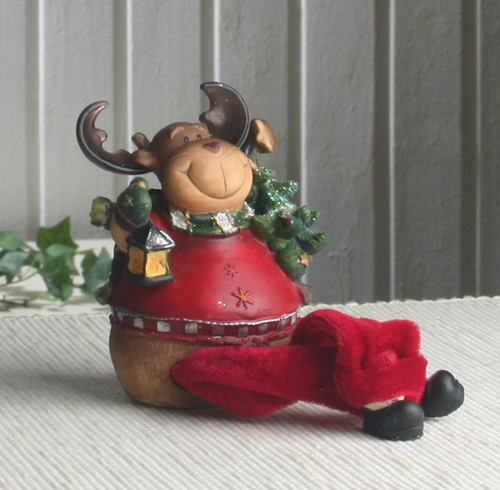 Kantenhocker Elch "Ole" mit Tannenbaum Kantenhocker Elch "Ole" mit Tannenbaum