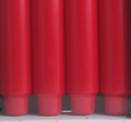 4x Stabkerze mit Zapfenfuß / Punchkerze, 25x3 cm, rubinrot