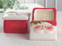Dekokerze in Keramikdose, viereckig, Weihnachtsmann creme-rot