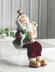 Weihnachtsmann Santa mit Brieffeder, Kantenhocker