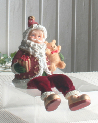 Weihnachtsmann Santa mit Teddy und Geschenk, Kantenhocker