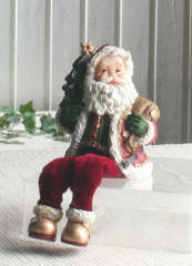 Weihnachtsmann Santa mit Tannenbaum und Sack, Kantenhocker