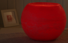 Wachswindlicht, rund, ca. 15 cm Ø, rubinrot / bordeaux